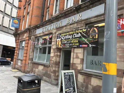 The Station Bar is next door.