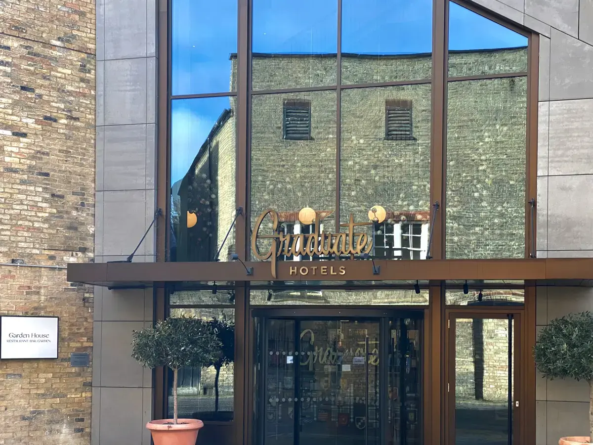 The Graduate Hotel by Hilton, view looking at it from just outside it's quiet drop off area.