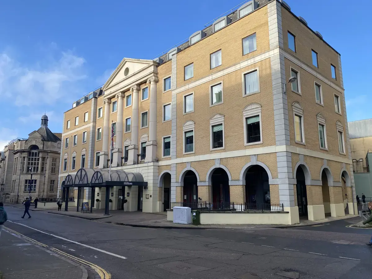 The Hilton Hotel Located in Central Cambridge showing the hotel from an angle looking at it from across the Downing Street.