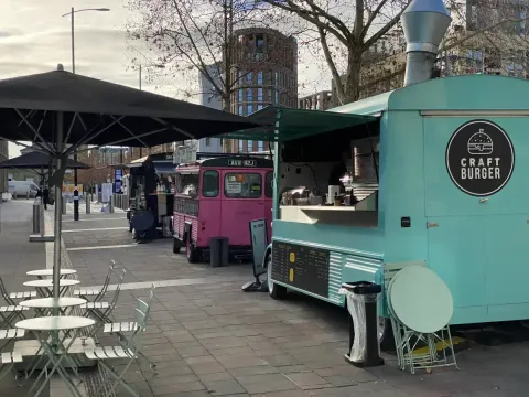 The local vendors outside the train station and a very short (1 minutes walk away) walk from the ibis. Ideal for a non-hotel burrito or coffee.