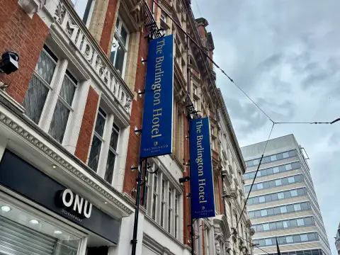 Macdonald Burlington Hotel signage outside Burlington Arcade as seen from Stephenson Street.