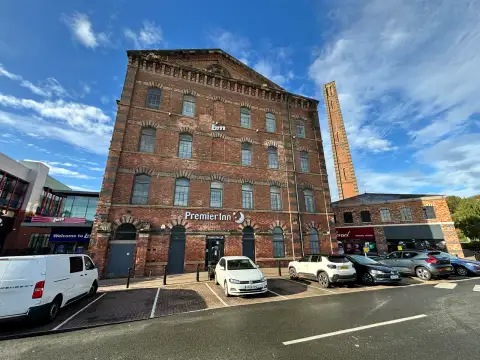 Premier Inn Kidderminster hotel exterior. A converted mill.