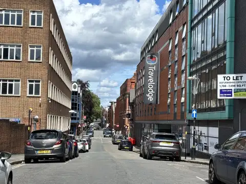 A view of Charlotte Street looking towards Newhall Street from the hotel. Note the proximity of the Travelodge. In the distance is St. Pauls Square.