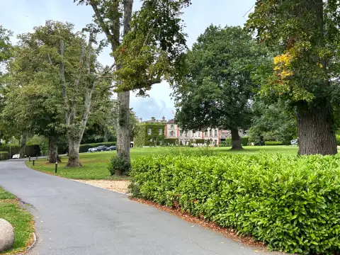 A view up to the hotel from the entrance area of the driveway. 