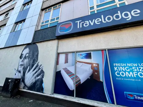 Ozzy wall art next to the Travelodge reception. 