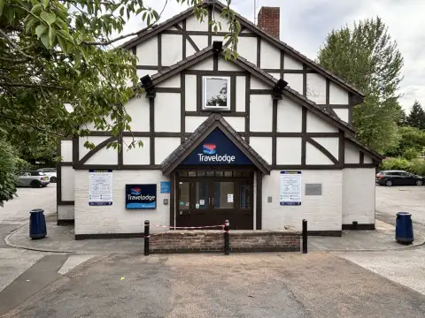 Travelodge Birmingham Streetly hotel main building and reception.