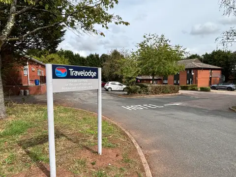 Travelodge Hartlebury hotel exterior and entrance with signage