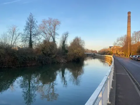 The walk by the river cam, just a few minutes away. Kerb Collective coffee is right by that old chimney stack. 
